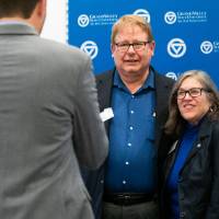 People posing at photobooth